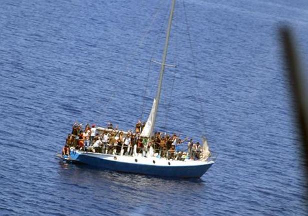 imigranti na brodu